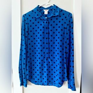 Women’s long sleeve, lightweight, fabric, blouse, in blue polkadot.